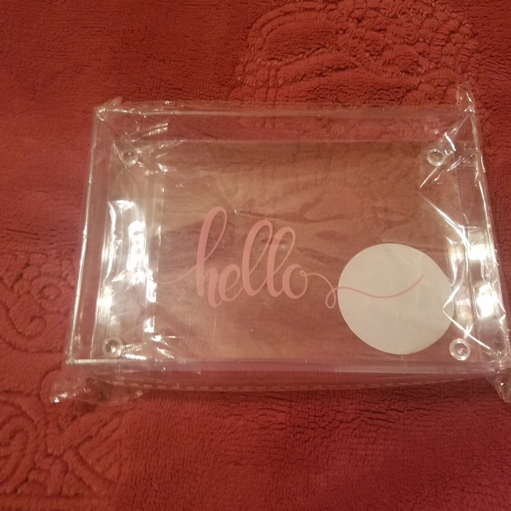 Free w/any purchase* Acrylic trinket tray.